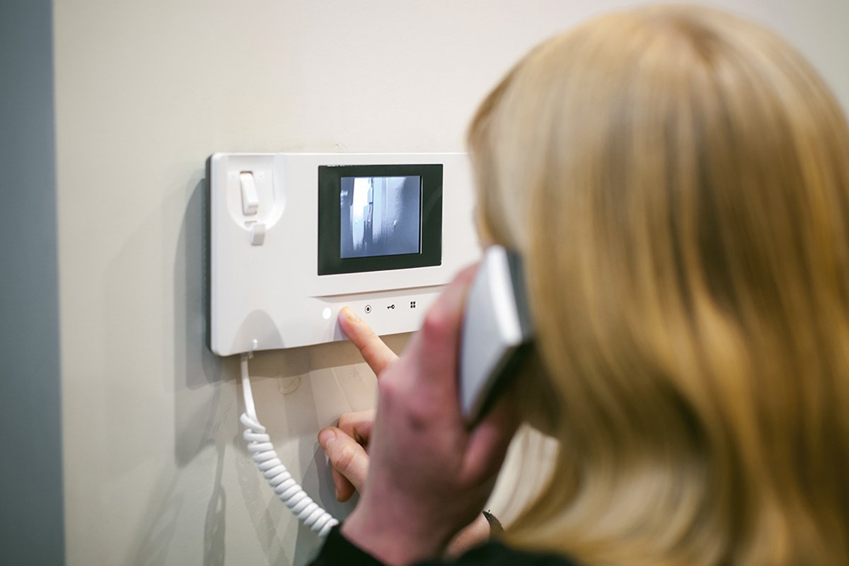 A person using their CCTV camera.